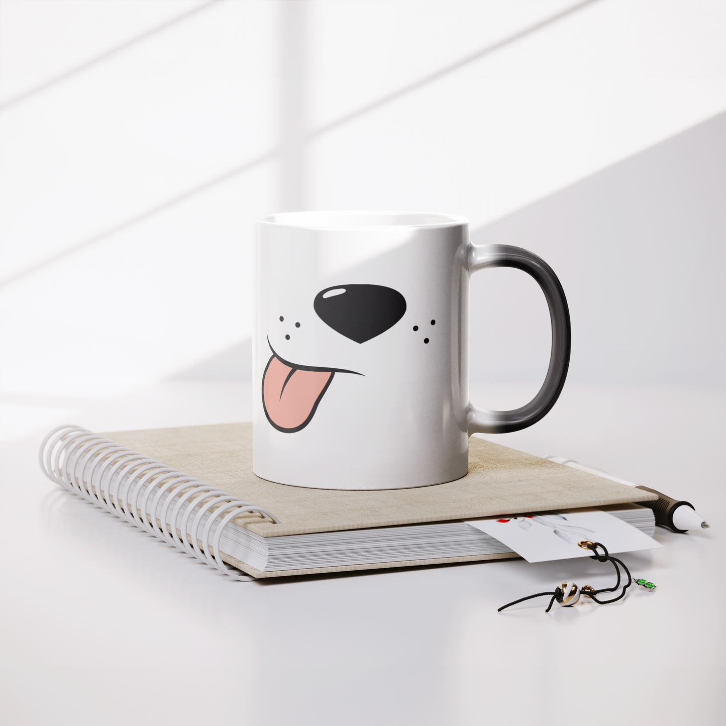11oz_Magic_Mug_-_Side_Tongue_Lifestyle_Notebook_Mockup.png
