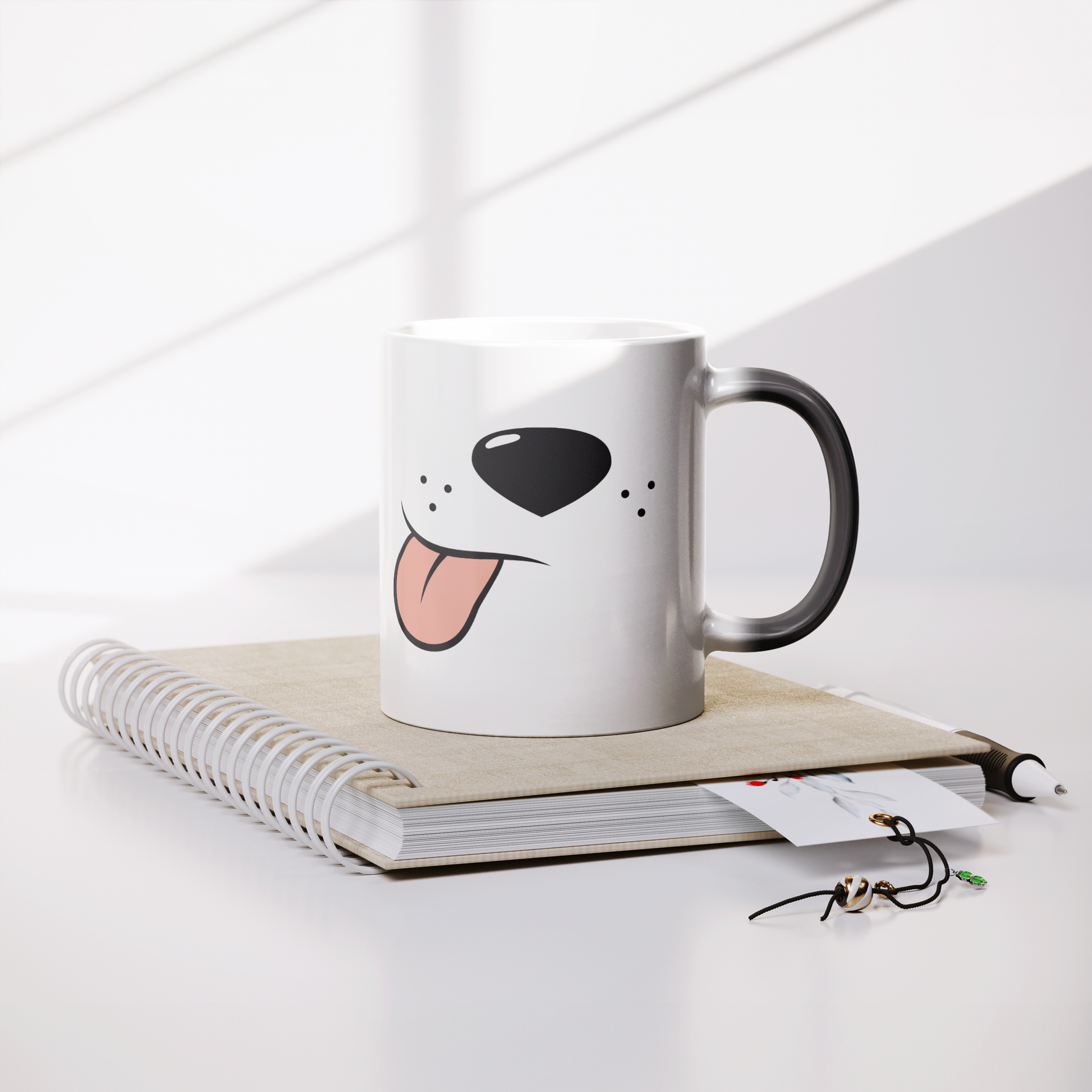 11oz_Magic_Mug_-_Side_Tongue_Lifestyle_Notebook_Mockup.png