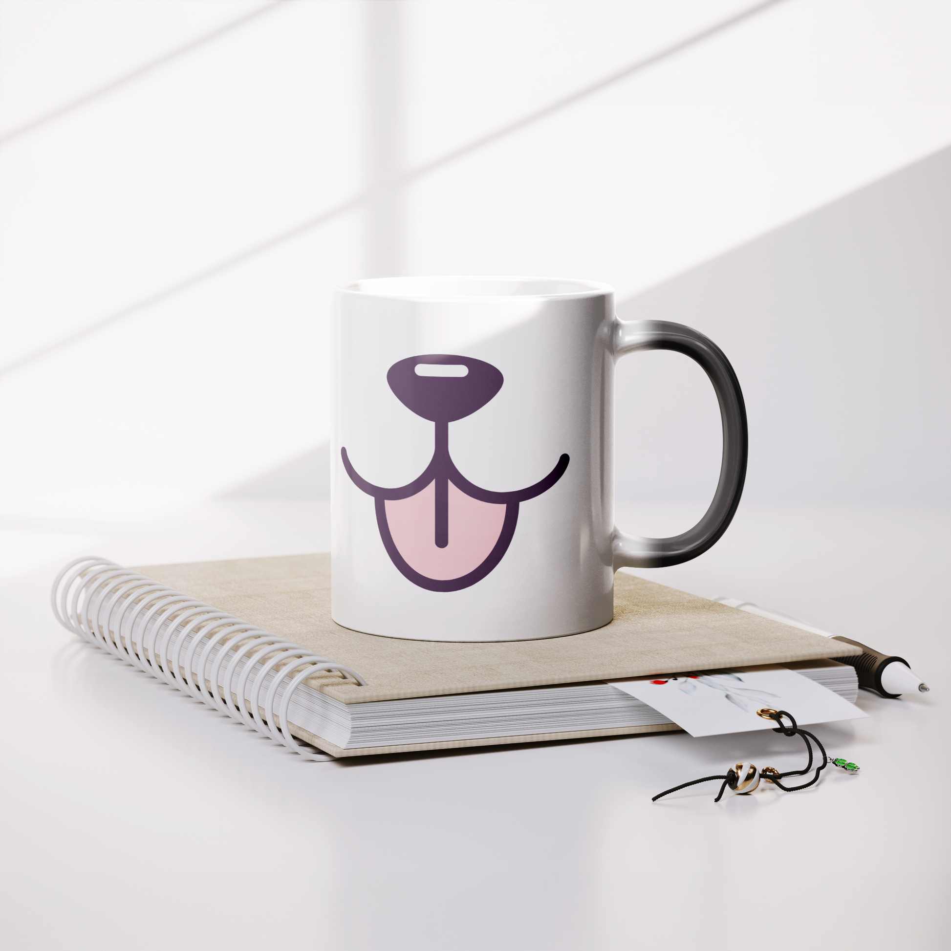 11oz_Magic_Mug_-_Tasty_Tongue_Lifestyle_Notebook_Mockup.png